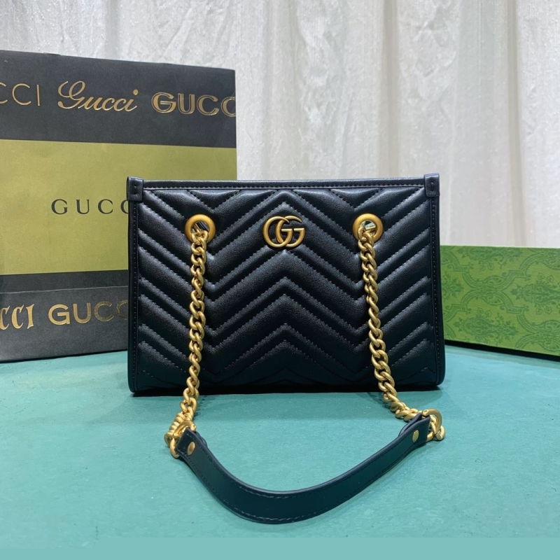 G*u*i shopping bags
